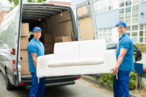 Loading boxes and furniture for house removals in Putney