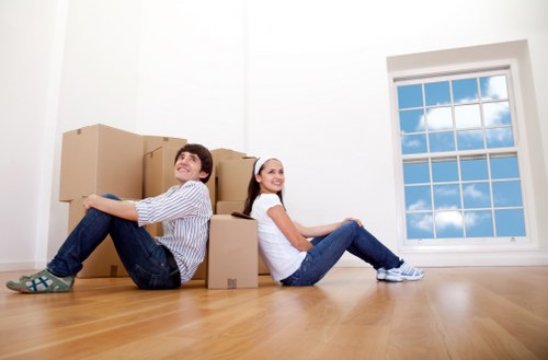 Removal van loading reusable furniture for recycling and charity donation in Putney