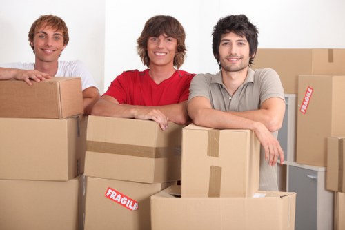 Furniture and boxes being loaded into a van for a Putney relocation