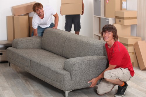 Local removals specialists managing furniture and boxes in Putney